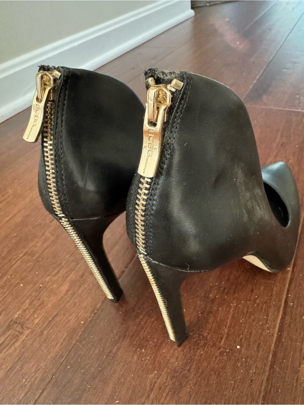 BCBGeneration Black High Heel Pumps with Gold Back Zipper